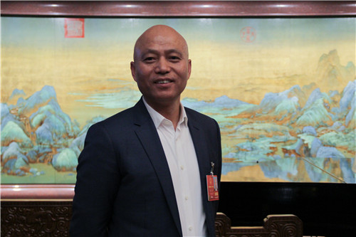 全国人大代表、广东天龙油墨集团股份有限公司董事长冯毅