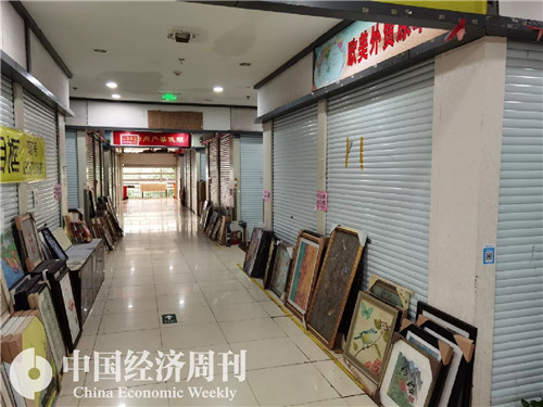 杭州环北小商品市场内不少商铺关门歇业